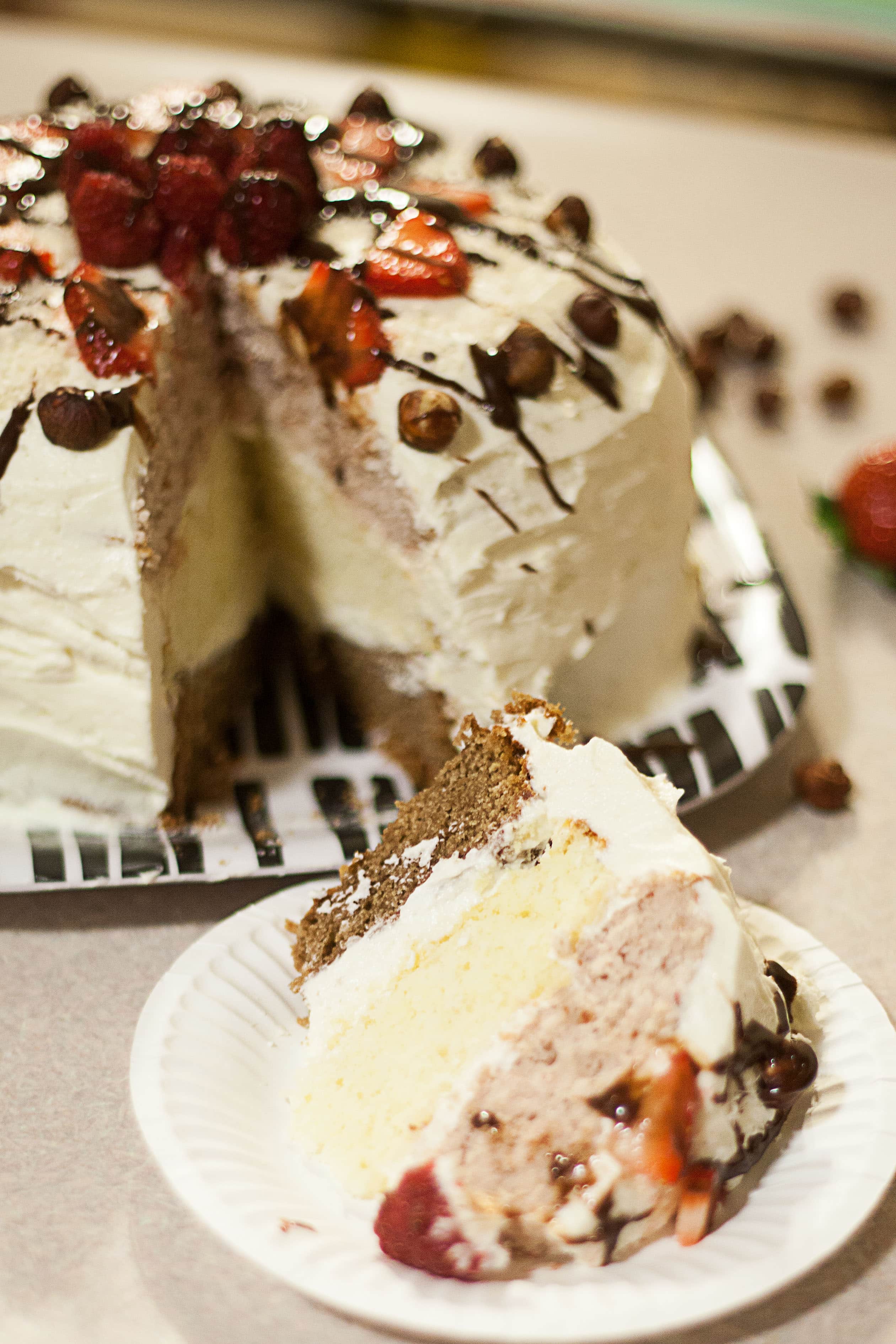 This neapolitan layer cake is the perfect grown up birthday cake, layers are strawberry, nutella, and vanilla, and it is sooo tasty! callmebetty.com