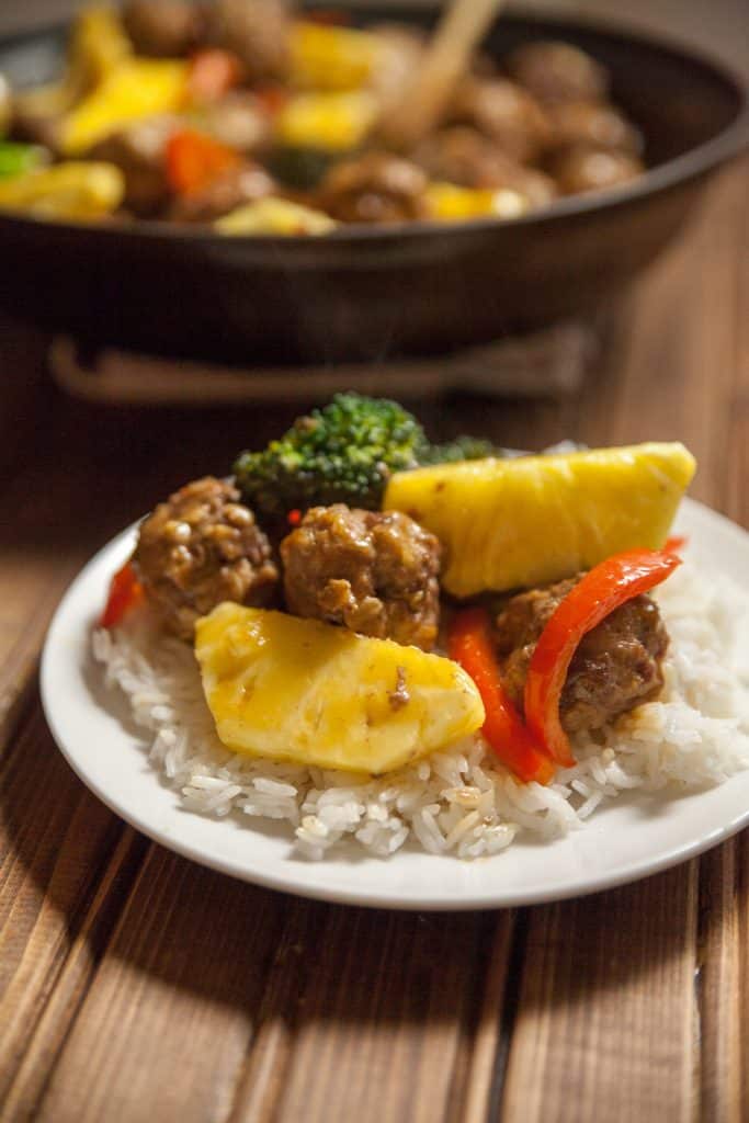 These healthy sweet and sour meatballs are made lighter by cutting down on sugar and using some ground turkey. They don't skimp on flavor though, with fresh pineapple and perfectly seasoned meatballs.