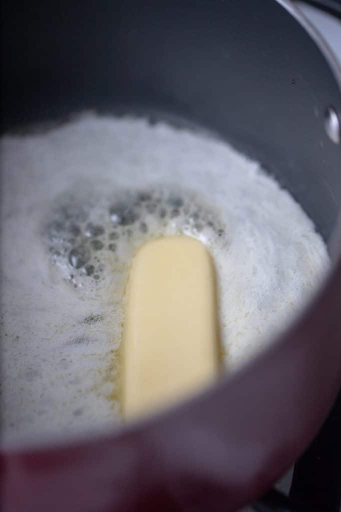 Butter melting in pan for homemade condensed cream of chicken soup