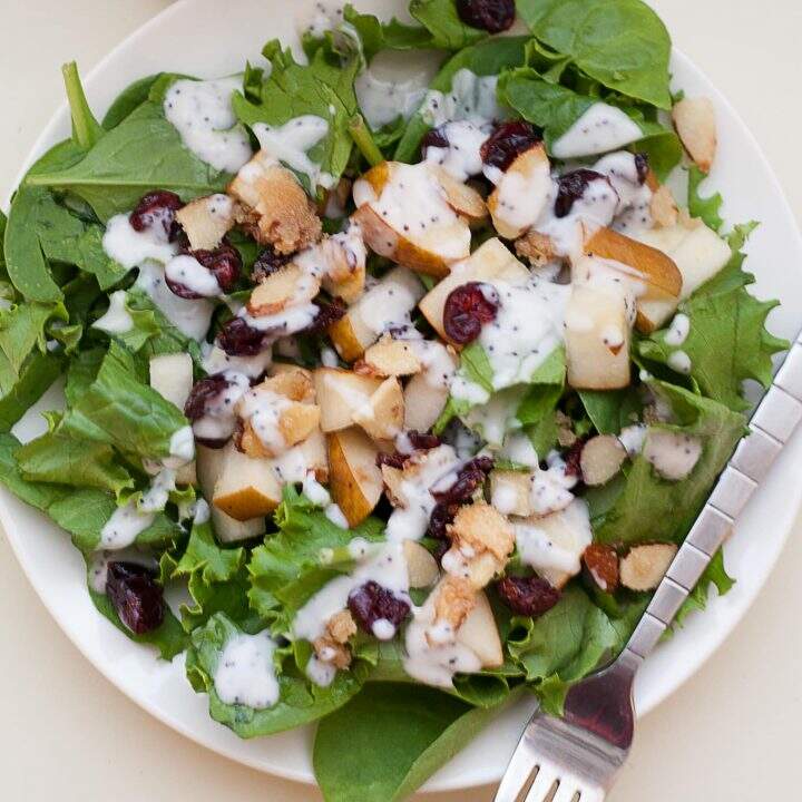 This pear and apple salad from Call Me Betty is sure to be a hit at all your autumn parties! www.callmebetty.com