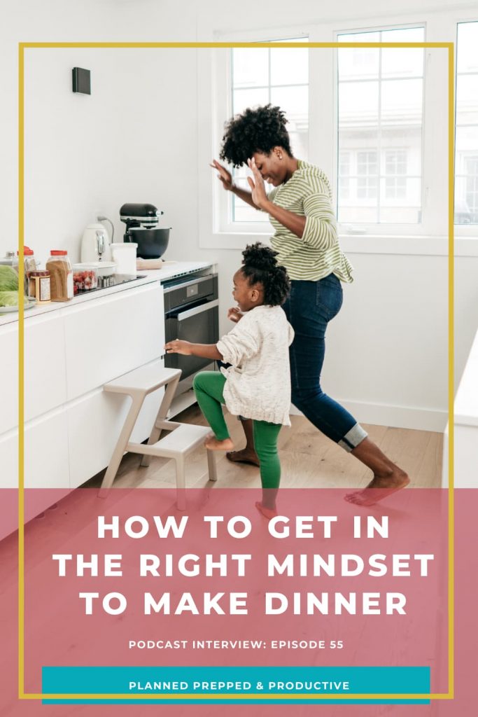 mom and daughter dancing in the kitchen with text overlay how to get in the right mindset to make dinner